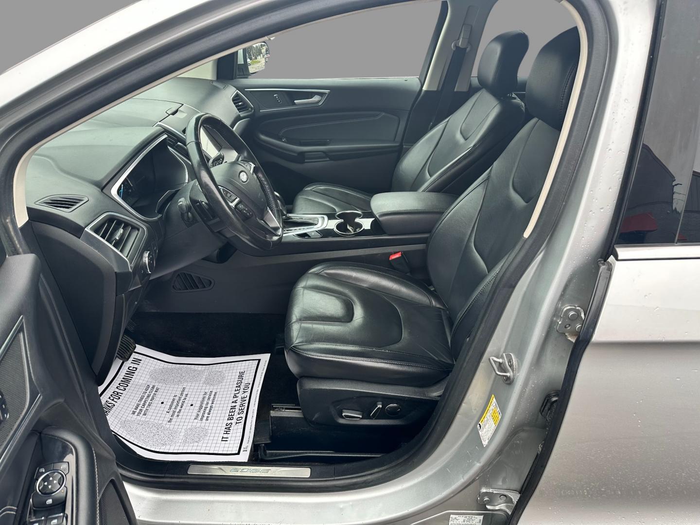 2017 Silver /Black Ford Edge Titanium (2FMPK4K92HB) with an 2.0L I4 DOHC 16V Turbo engine, 6-Speed Automatic transmission, located at 547 E. Main St., Orwell, OH, 44076, (440) 437-5893, 41.535435, -80.847855 - This 2017 Ford Edge Titanium AWD is a well-equipped midsize SUV. It comes with a powerful yet efficient 2.0L EcoBoost engine paired with a smooth 6-speed automatic transmission. Notable features include LED daytime running lights, dusk-sensing headlights, leather interior, auto-dimming rearview mirr - Photo#15